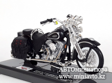 Автоминиатюра модели - Harley-Davidson FLSTS Heritage Softail Springer 1999 black 1:18 Maisto