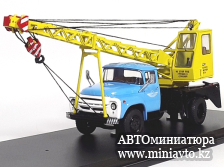 Автоминиатюра модели - Автокран АК-75В (на шасси ЗИЛ-130) голубая кабина/жёлтый 1:43 SSM