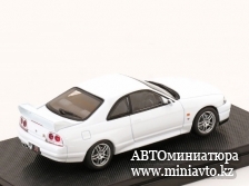 Автоминиатюра модели - Nissan Skyline GT-R R33 V Spec 1995 white  1:43 Ebbro